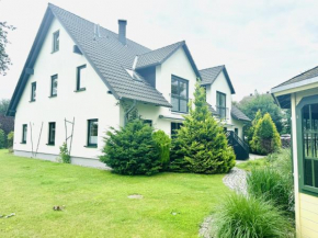 F-1112 Ferienwohnung Lobbe FeWo 02 strandnah, Garten